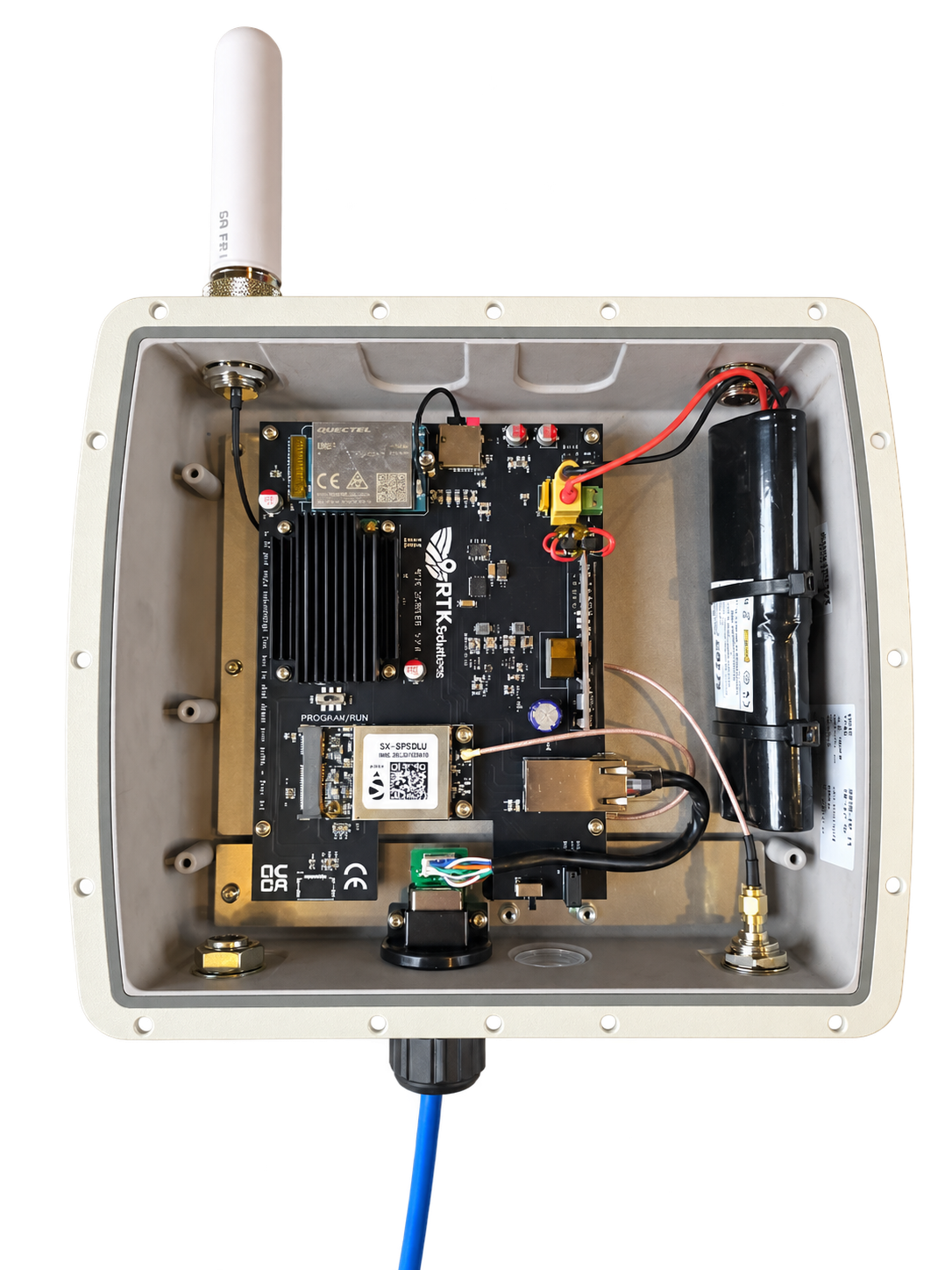 Open RTK Solutions base station with carrier PCB, heatsink, GNSS receiver, communications and battery; background removed