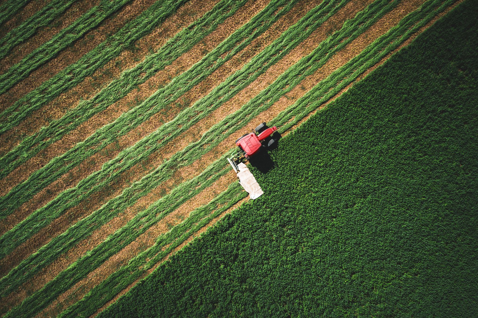 Tractor working in a field using network RTK corrections